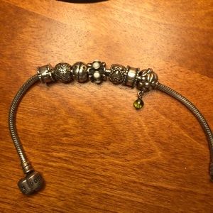 Pandora bracelet with 5 charms, hardly worn